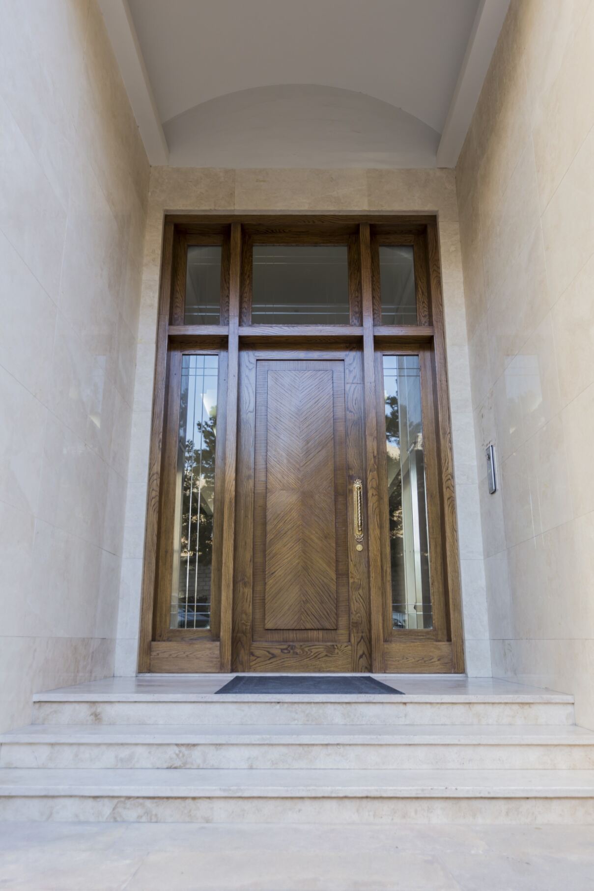 Elegant front entrance of Jamal Abad Residence, showcasing modern architecture and upscale design