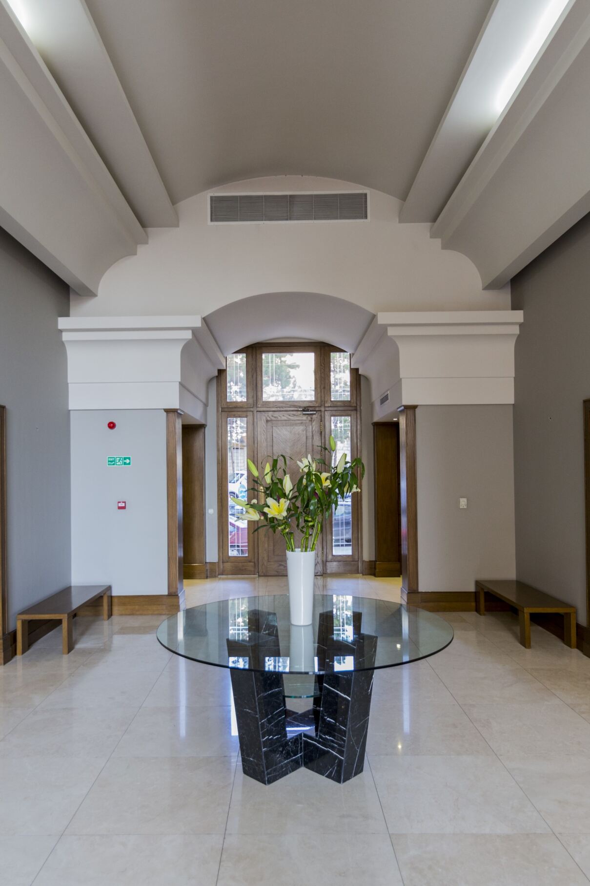 Interior view of the elegant lobby at Jamal Abad Residence, featuring modern design and upscale finishes