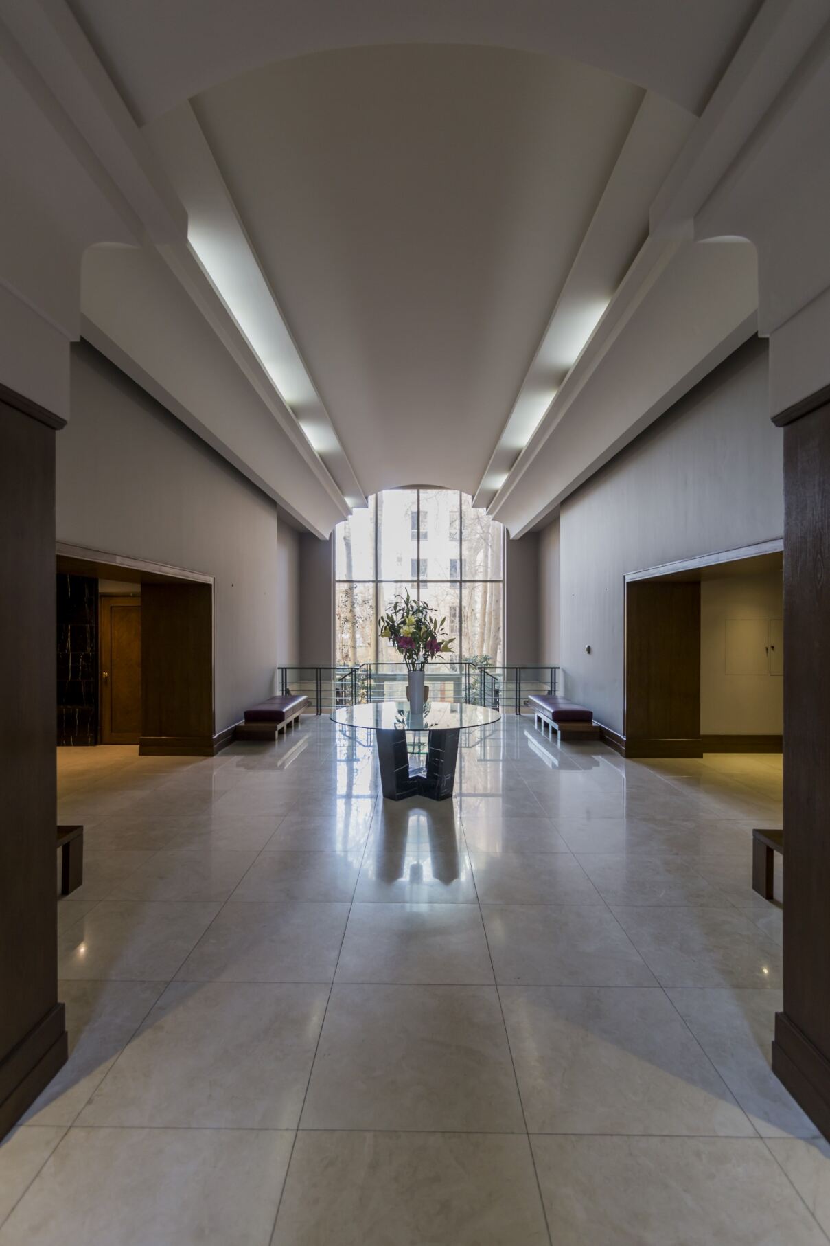 Interior view of the elegant lobby at Jamal Abad Residence, featuring modern design and upscale finishes